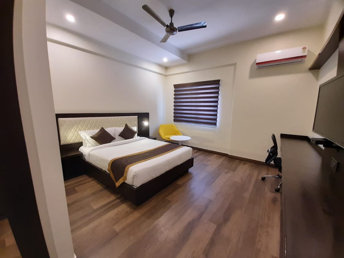 Treebo Premium Raj Vista Global Village photo 9